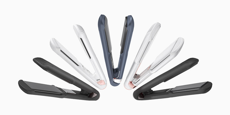 Five CLOUD NINE straighteners in black, white and blue fanned out on a white background.